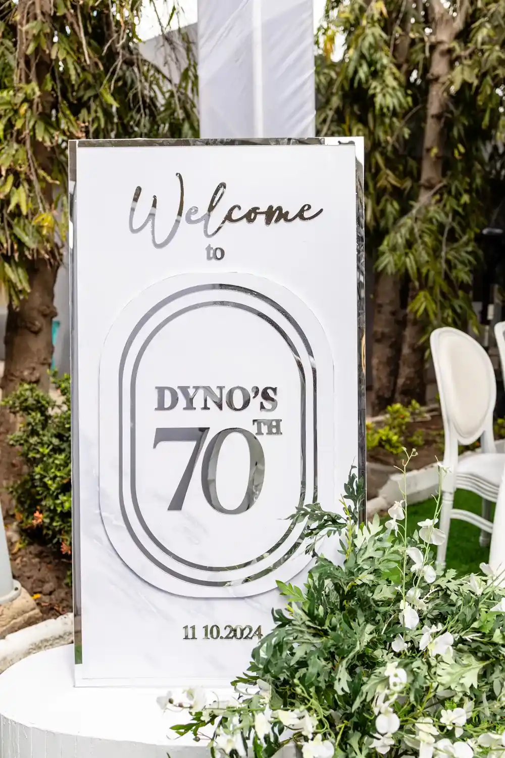 Dyno’s 70th birthday welcome board styled for a celebration